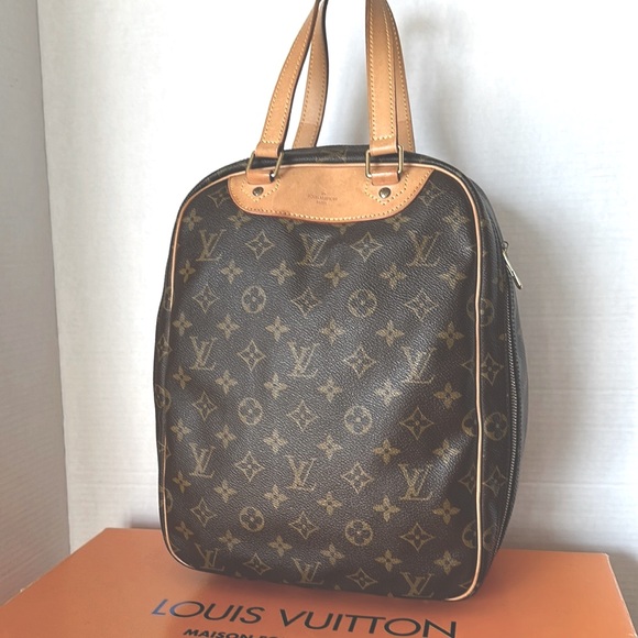 Louis Vuitton Handbags - Louis Vuitton Excursion Hand Bag Monogram Canvas.